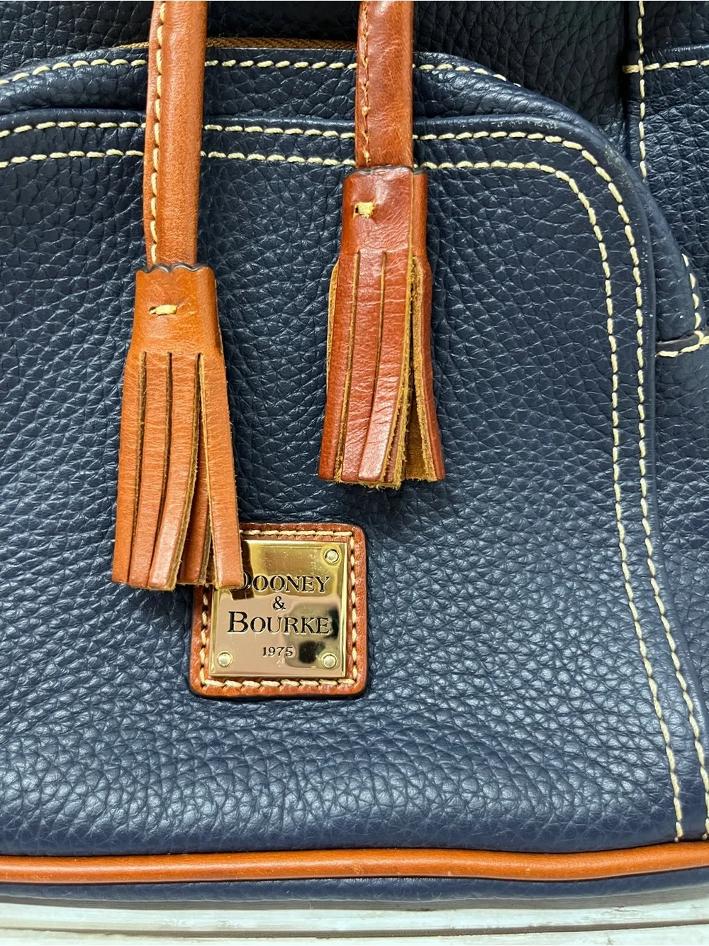 Dooney & Bourke Navy Pebble Grain Leather Backpack Bag with Brown Trim